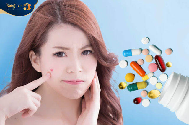 Dùng thuốc trị mụn